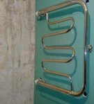 How to properly hang a rack for a towel dryer with your own hands