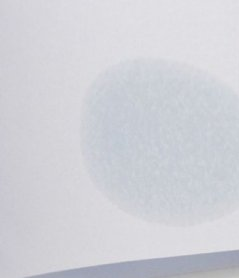 How to remove a greasy stain from paper with improvised means?