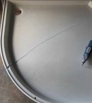 Better to seal the crack in the acrylic shower tray with your own hands