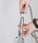 Step-by-step instructions on how to properly disassemble a shower head