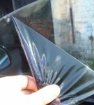 The best is to wash the car glass tint glue yourself