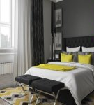 Bedroom interior design in gray tones, successful color combinations and style features