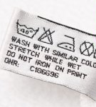 Decoding of icons about washing clothes and a table with descriptions of symbols