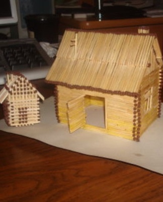 a house with a door of matches