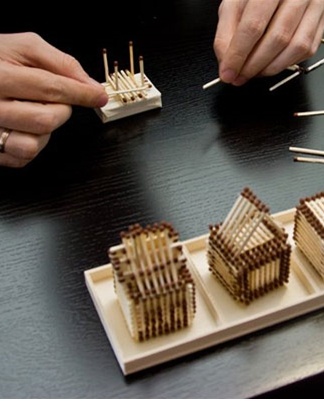 the process of creating a house of matches