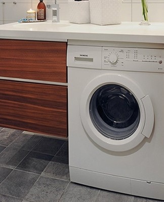 washing machine integrated in the bathroom