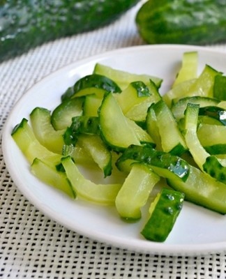 chopped cucumbers on a plate