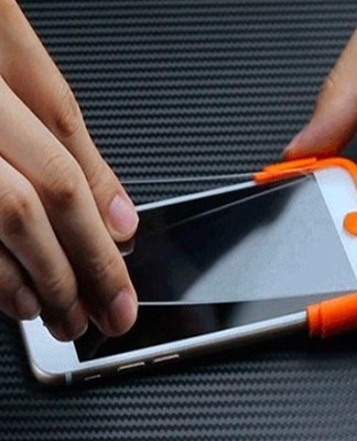 the process of gluing glass on an iPhone