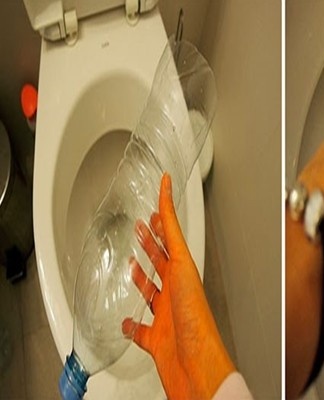 cleaning the toilet with a bottle