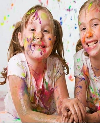 You can use dishwashing liquid to wash the poster paint off your clothes.