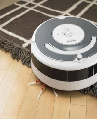 Moving inside, the robot probes the space for obstacles.