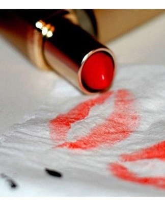 A small amount of product is applied to a lint-free cloth and the stained area is soaked.