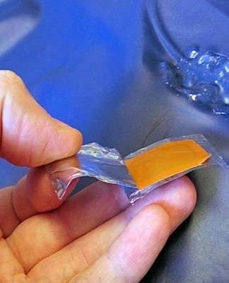 the process of gluing the patches to the mattress