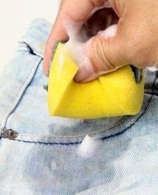 the process of washing stains on jeans