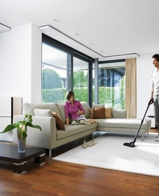 A huge amount of debris and dust accumulates on the floor, especially under the bed.