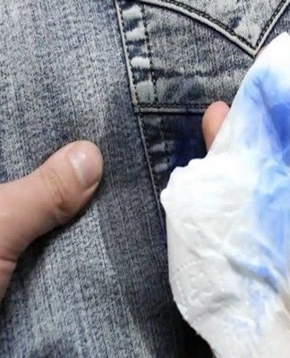 The contaminated area is pre-moistened with water and left for 4 minutes