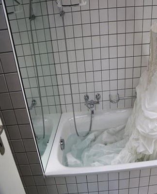 Boiled milk works well for removing ink marks.