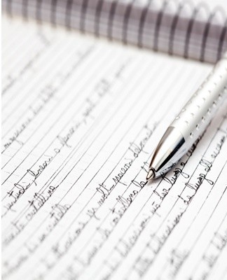 The ink is removed from the paper using an ultraviolet lamp or sunlight