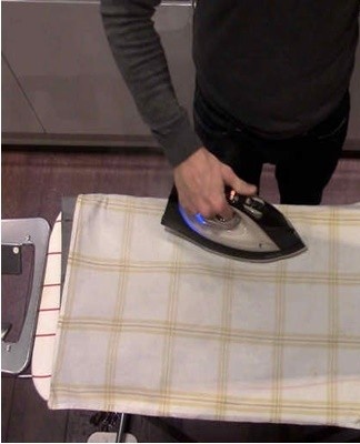 The muslin is ironed through a damp material at 60°C, not steamed.