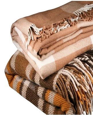 The drum of the washing machine can alter the appearance of the blanket.