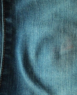 From interaction with certain solutions, denim can come loose and stain.