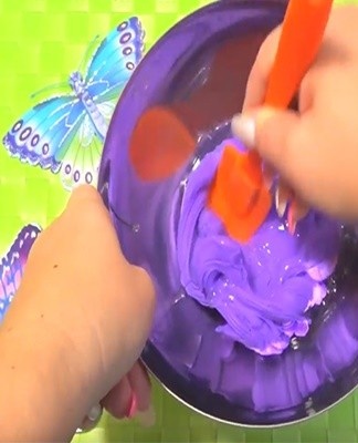 Plasticine is heated in a metal dish to soften it and mix it with the rest of the ingredients.