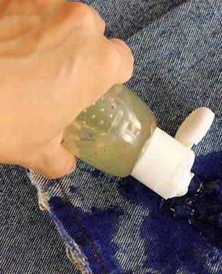  You can try scrubbing the stains with a solvent like white spirit or acetone.