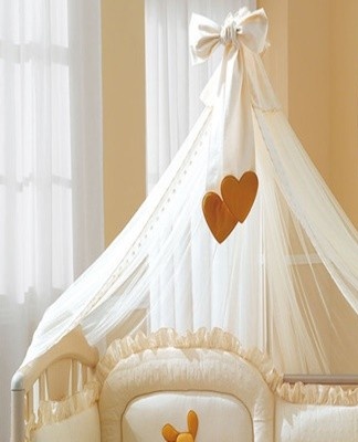 You can create the perfect canopy over the bed by positioning the fabric frame around the perimeter of the crib.