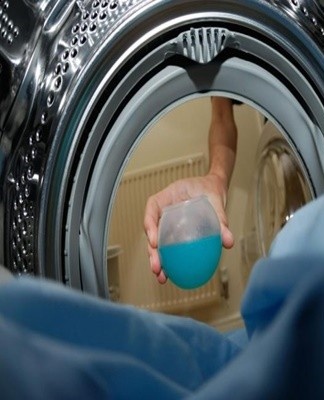 Before washing bags and covers in a typewriter, study the label.