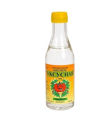 Wipe the window with a cloth soaked in acetic acid.