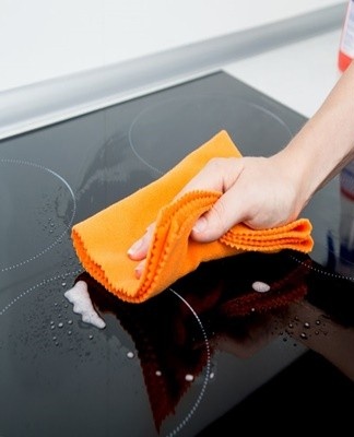 Vinegar is a mild disinfectant for stove maintenance.