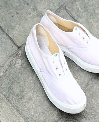 Unlace and untie the sneakers, then remove the soles.