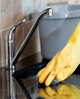 A vinegar solution and composite stone cleaners are useful for removing limescale.