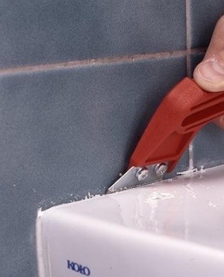 The task is to soften the layer, followed by removal with the help of a scraper, spatula.