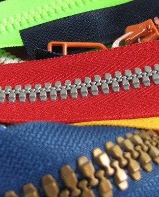 Instead of tearing the zipper, a new zipper is alternately hemmed at the bottom.