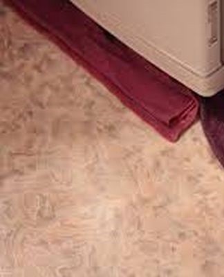 rags under the refrigerator