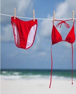 It is not uncommon for a bathing suit to contain oil and sunscreen used on the beach.