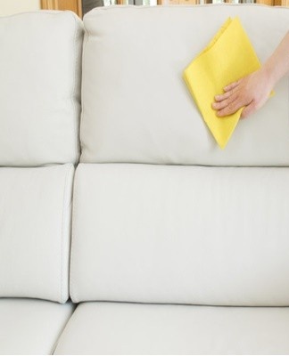 To wash white artificial leather, you need to soak a sponge in a liquid and then apply the product.