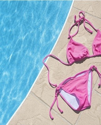 A dried swimsuit is stretched and cleaned with a brush, a wet swimsuit is thoroughly washed under running water.