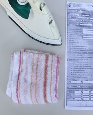 If the creases on the paper are very pronounced and the sheet itself is very hot, it is recommended to use the wet ironing method
