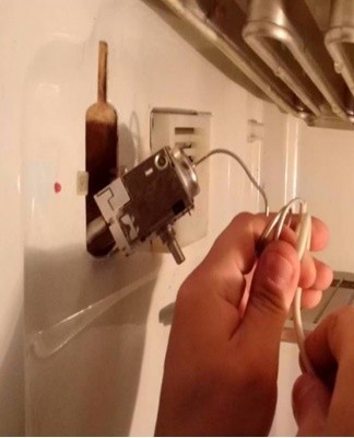 When you begin to disassemble the thermostat, be sure to unplug the refrigerator.