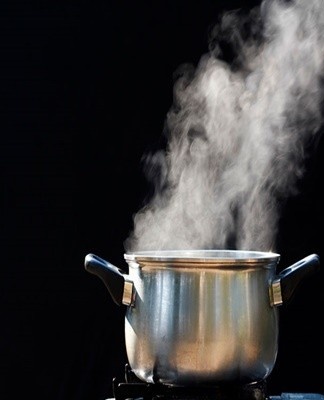 Pour pre-boiled water over the battery from above, not forgetting the side parts.