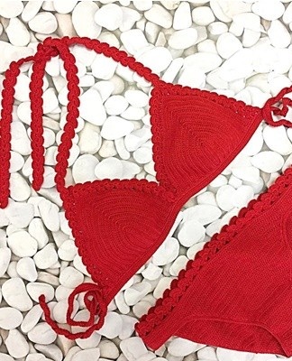 A price tag or hygienic wrap stuck on the gusset can leave glue marks on a swimsuit.