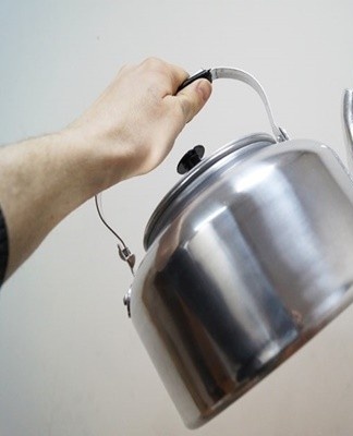 Aluminum surfaces are cleaned with hot water and detergent or soap.