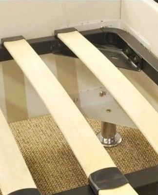 Most often, the slats of sofas are made of wood.