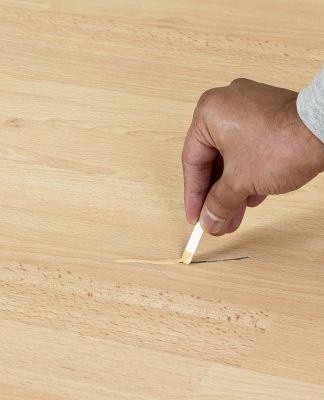 Very large damage to the floor can be rubbed with a special wood filler.