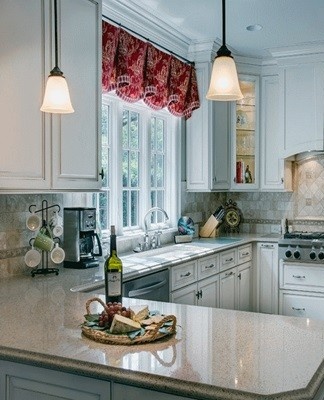 You can pick up a ceramic tile panel covering the wall behind the stove and sink with it.