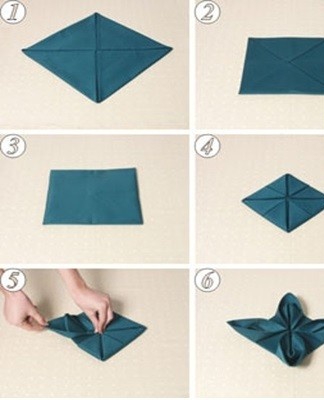 Fold the straightened square twice on the center fold lines, to get a smaller square.