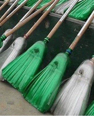 Insert the handle into the neck and secure it with self-tapping screws.