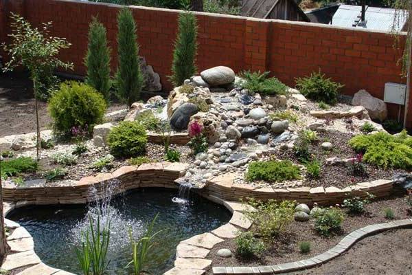 stones under the fence